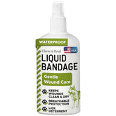 Chew + Heal Labs pet liquid bandage spray on dog wound for protection and quick drying.