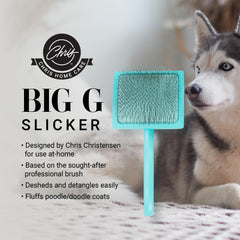 Teal Big G Slicker Brush large side view held for comfortable grooming