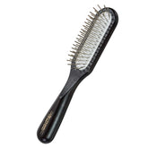 Chris Christensen Ice Slip Brush head glides smoothly for gentle detangling.