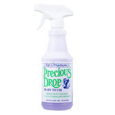 Chris Christensen Precious Drop conditioner bottle for easy grooming and glossy coats.