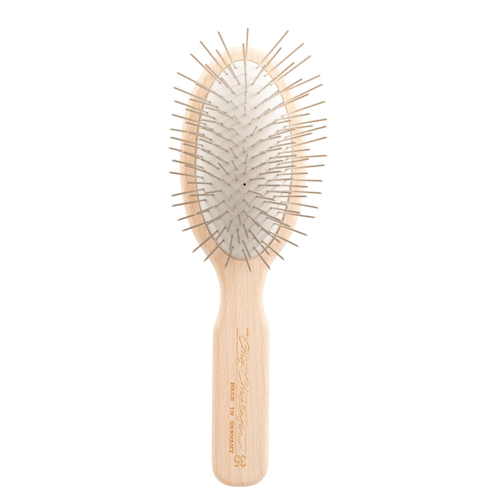 Chris Christensen 35 mm Oval Pin Brush body showcases premium beechwood and steel pins for gentle grooming.