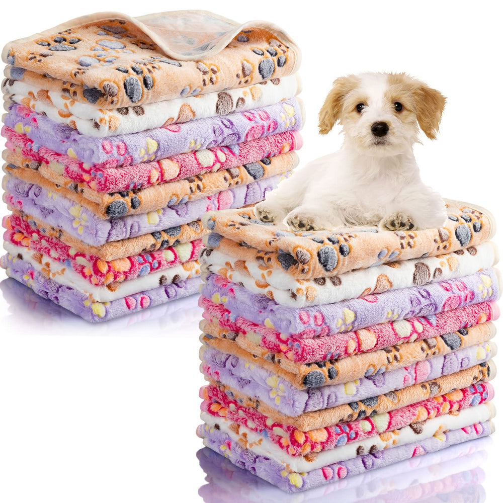 Chumia paw-print dog blanket in soft fleece for cozy use.