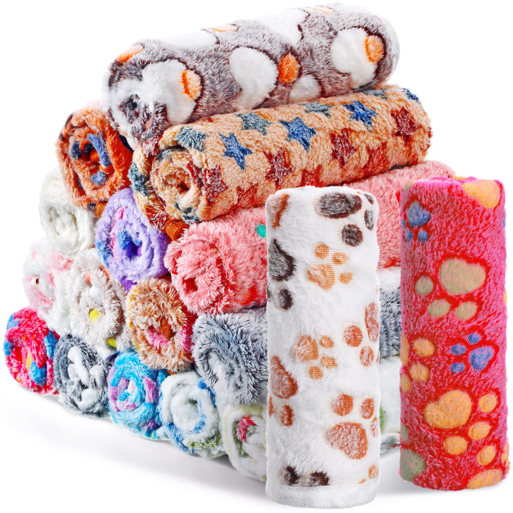 Chumia puppy blanket with paw print design provides soft warmth for small pets.