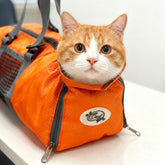 Cinf cat grooming bag front view showing versatile access for nail trimming