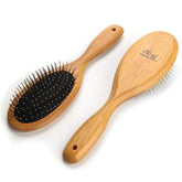 Clumsy Pets ball pin brush with bamboo handle for comfortable grooming.