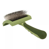 Coastal Safari curved firm slicker brush with ergonomic handle for comfortable grooming.