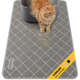 Conlun cat litter mat with grid pattern traps litter around the box.