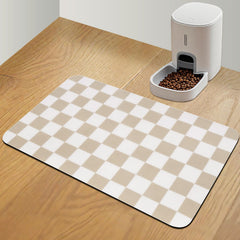 CooRug checkered mat with absorbent surface captures spills for a cleaner feeding space.