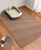Cooyes cat litter mat cut to fit any space beside the box.