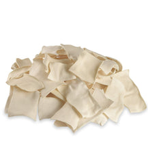 Cowdog Chews thick-cut rawhide chips close-up highlighting dense texture for durable chewing.