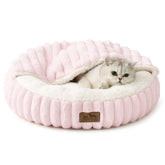 COZY KISS cat bed with hooded cave providing secure, cozy nesting for curled sleepers.