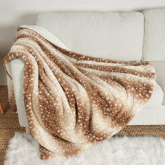 COZY KISS deer print blanket front view protects sofa with plush warmth.