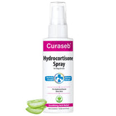 Curaseb hydrocortisone spray bottle close-up indicating quick itch relief potential.