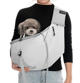 CynosCape small-dog sling carrier front view with secure, comfortable hold.