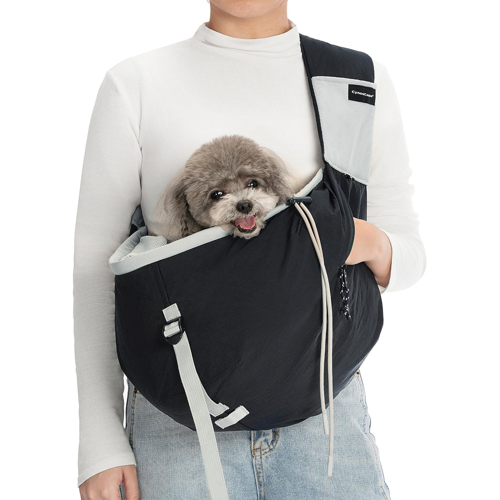 CynosCape small dog sling carrier worn, exterior view for hands-free outings.