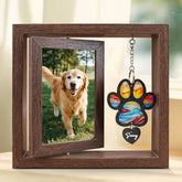 DearKeeps dog memorial frame with rotating base for desk display.