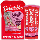 Delectables kitten treats in hand for bonding and interactive feeding.