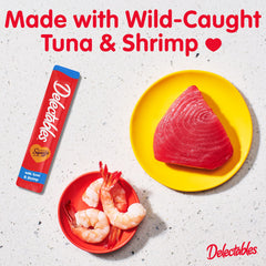 Close-up of Delectables Squeeze Up handheld feed showing creamy puree for interactive play.