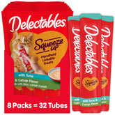 Delectables Squeeze Up tuna with catnip tube in hand for mess-free treat time