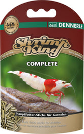 Dennerle Shrimp King Complete sticks sinking in a freshwater tank, supporting balanced growth.
