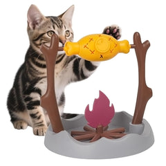DFQ cat slow feeder with BBQ campfire rotating roast enhances puzzle play during feeding.