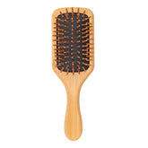 Doggy Style Small Bamboo Dog Brush close-up of natural handle and soft silicone bristles for gentle grooming.
