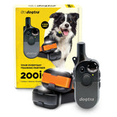 Dogtra 200iQ remote in hand showing one-handed training control.