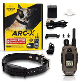 Dogtra ARC-X remote in hand showing training control and range capability