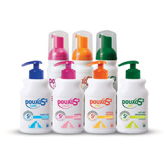 Close-up texture of Douxo S3 mousse, soft and non-greasy application.