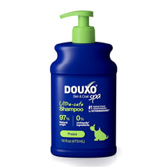 DOUXO Skin & Coat SPA bottle demonstrating gentle puppy cleansing