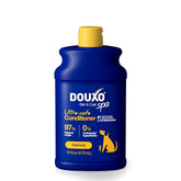 DOUXO Skin and Coat SPA oatmeal conditioner bottle highlighting ultra-safe formula for dogs