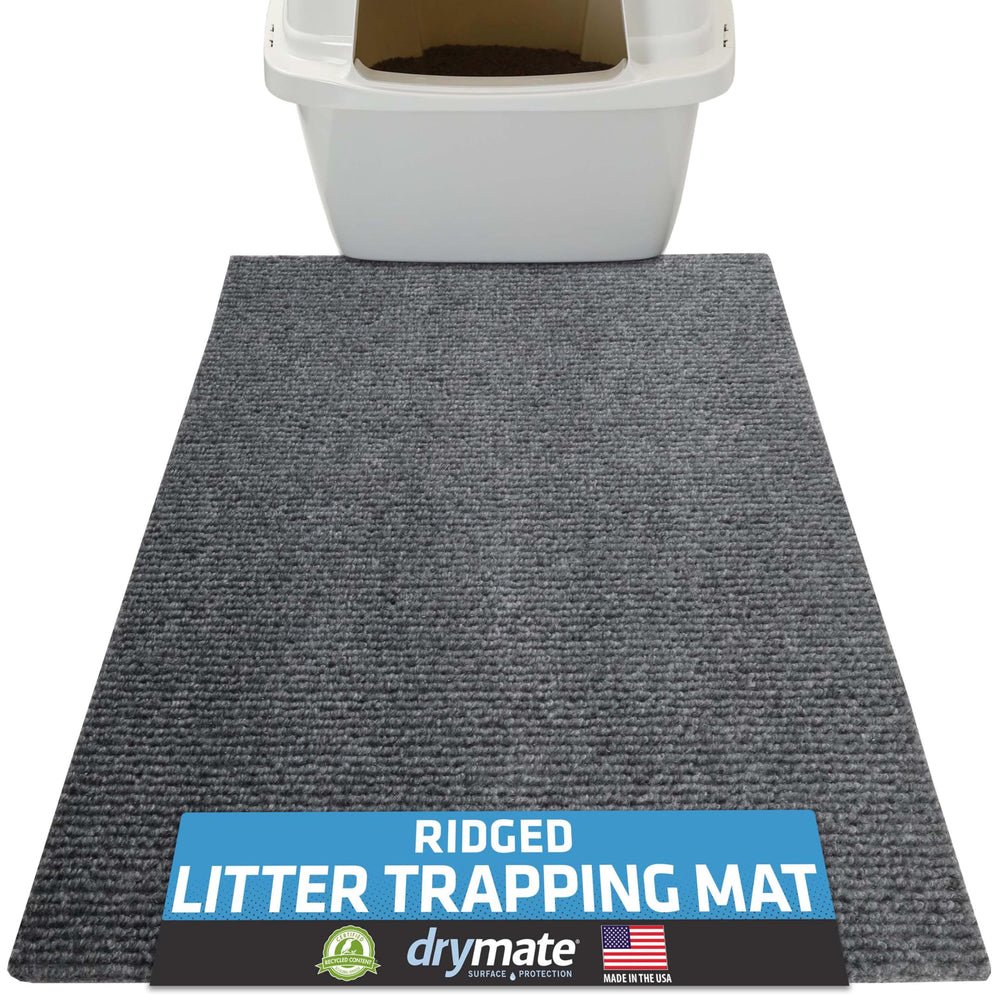 Drymate cat litter mat with ridged design traps litter and protects floors.