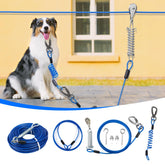Duckygoo Dog Runner in yard setup with 75 ft cable for extended outdoor roaming.