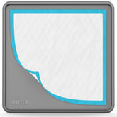 Eenk pee pad tray holder with a raised lip for spill prevention.