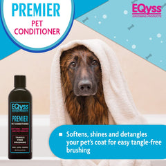 Applying Eqyss Premier Pet Conditioner to a wet coat to ease detangling