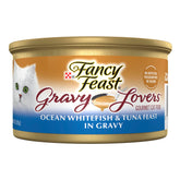 Fancy Feast Gravy Lovers Ocean Whitefish and Tuna Feast cans on shelf with savory gravy.