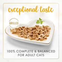 Fancy Feast grilled chicken and beef ingredients close-up, real meat highlights a premium recipe.