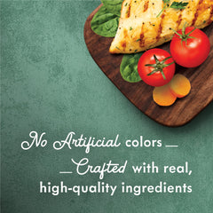 Closeup of Primavera kibble with real white meat chicken and colorful veggie accents.