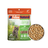 Feline Natural high-protein dry cat food open bag shows transparent ingredients for grain-free nutrition