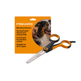 Fiskars pet grooming scissors with serrated teeth texture fur for natural blending.