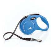 FLEXI New Classic tape leash extended to 16 feet for small dogs' comfortable freedom and control.