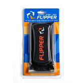 Flipper Standard algae magnet cleaner on glass surface for hands-free scrubbing.