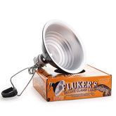 Fluker's Repta-Clamp Lamp mounted on a terrarium for warm basking