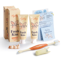 FlyDog Fresh Kiss packaging shows vet-approved dental care for dogs at home.