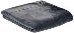 Friends Forever Bailey blanket shown on chair with two-tone reversible style for versatile decor.