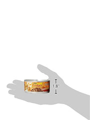Purina Friskies Extra Gravy chicken chunks in a serving bowl with gravy.