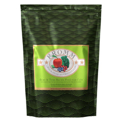 Fromm Four-Star Surf and Turf salmon recipe bag on counter, premium nutrition for cats.