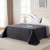 FunFurry waterproof blanket on dark couch protects furniture from spills