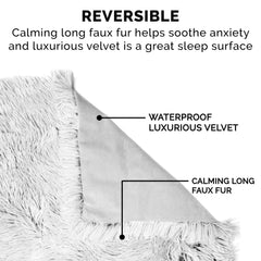 Dog relaxing on FurHaven blanket, illustrating nesting comfort