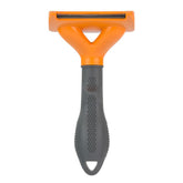 FURminator medium dog deshedding tool with ergonomic handle for comfortable grooming.
